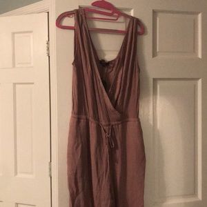 Never been worn ..One piece beige jumpsuit